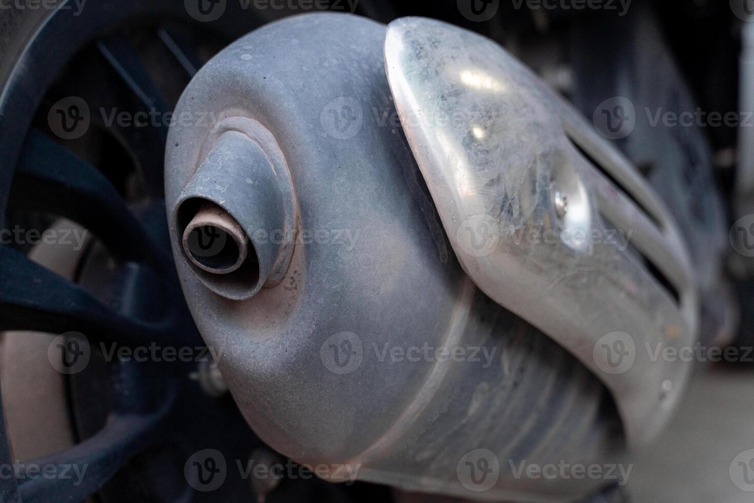 Motorcycle exhaust pipe from old motorcycles. Blurred background of vintage motorcycles. photo