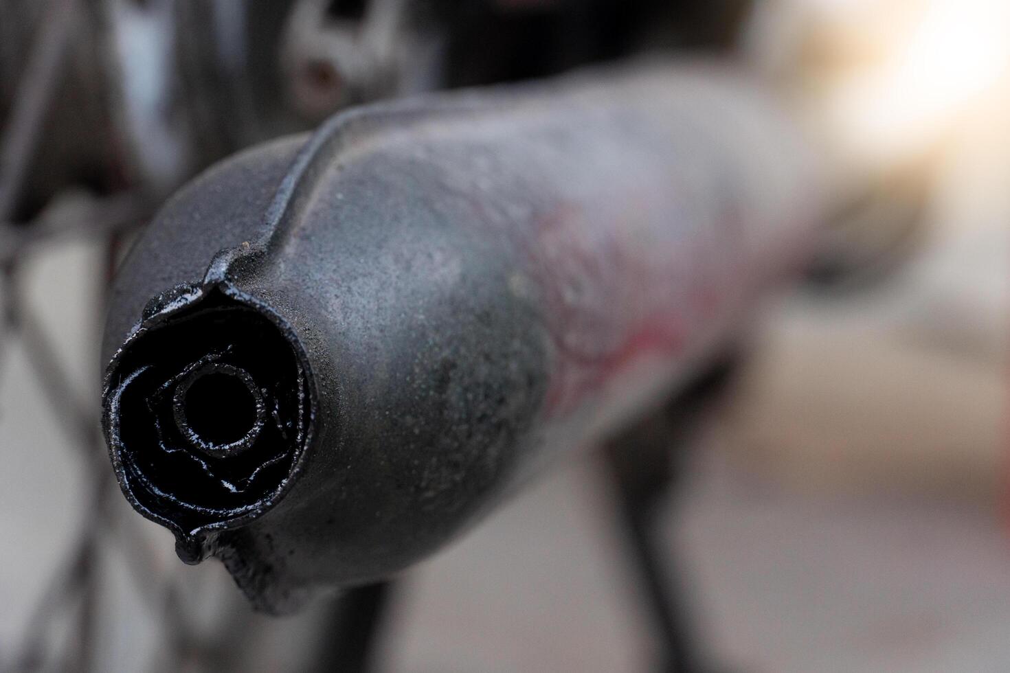 Motorcycle exhaust pipe from old motorcycles. Blurred background of vintage motorcycles. photo