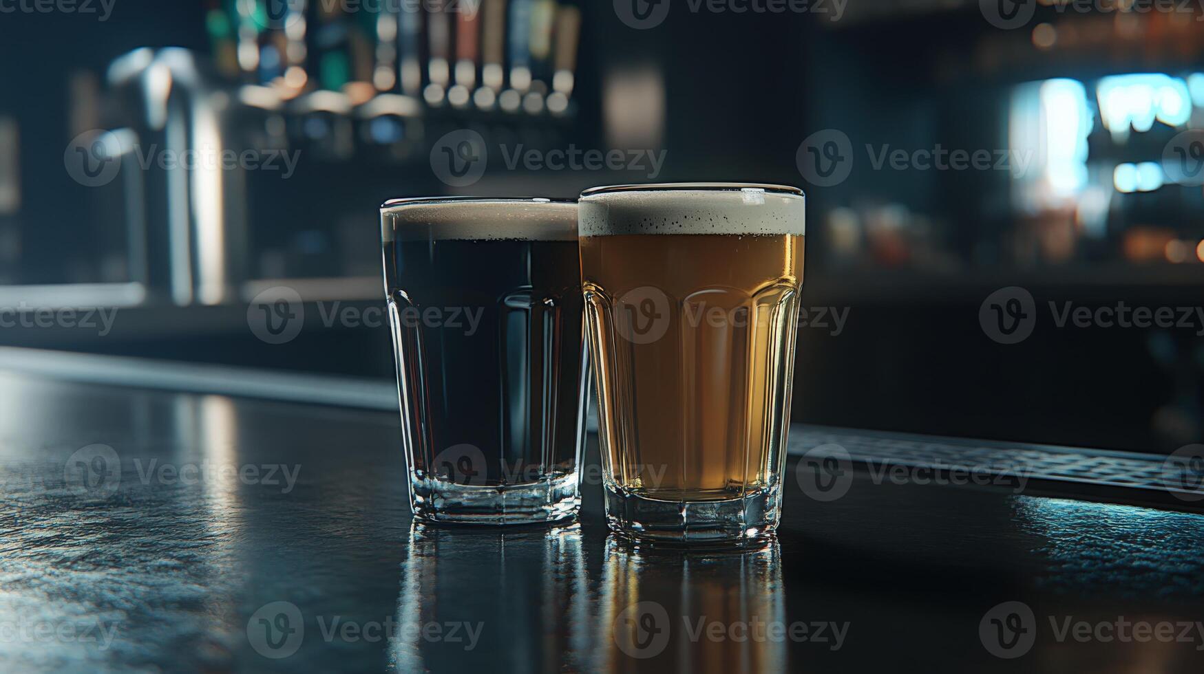 Two glasses of dark and light beer on a bar counter at night photo