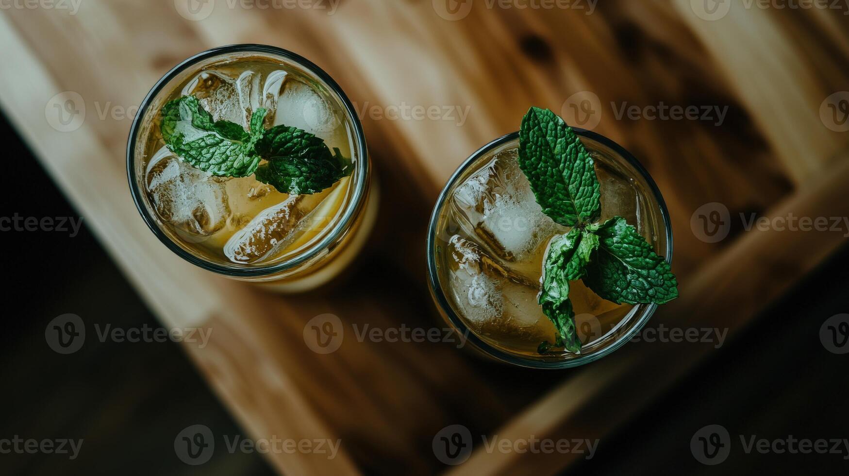 Refreshing green mint lemonade served with ice in summer afternoon photo