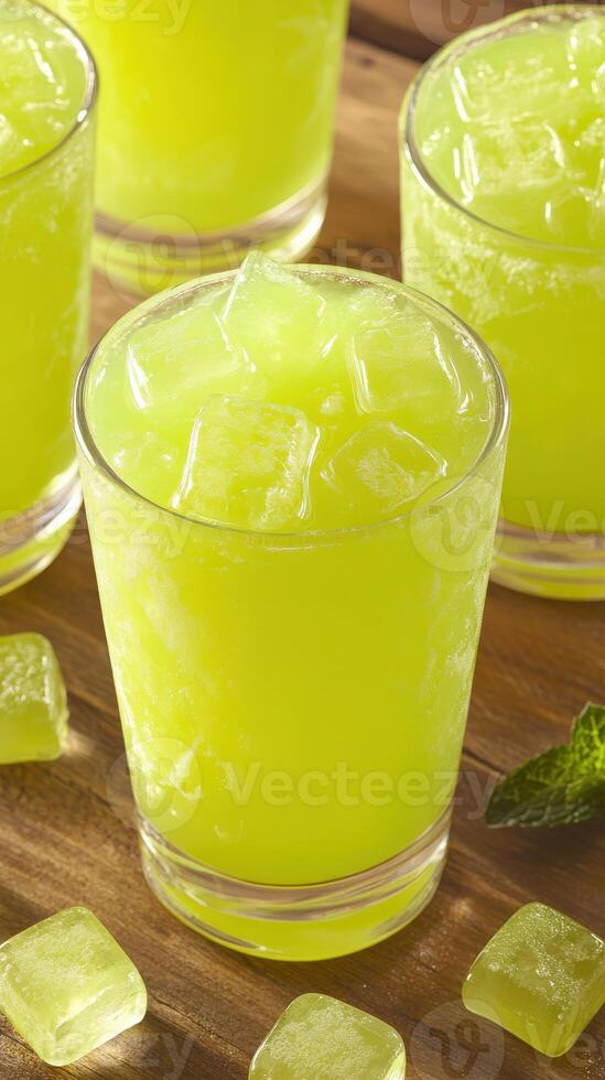 Refreshing green mint lemonade served with ice for a warm day photo