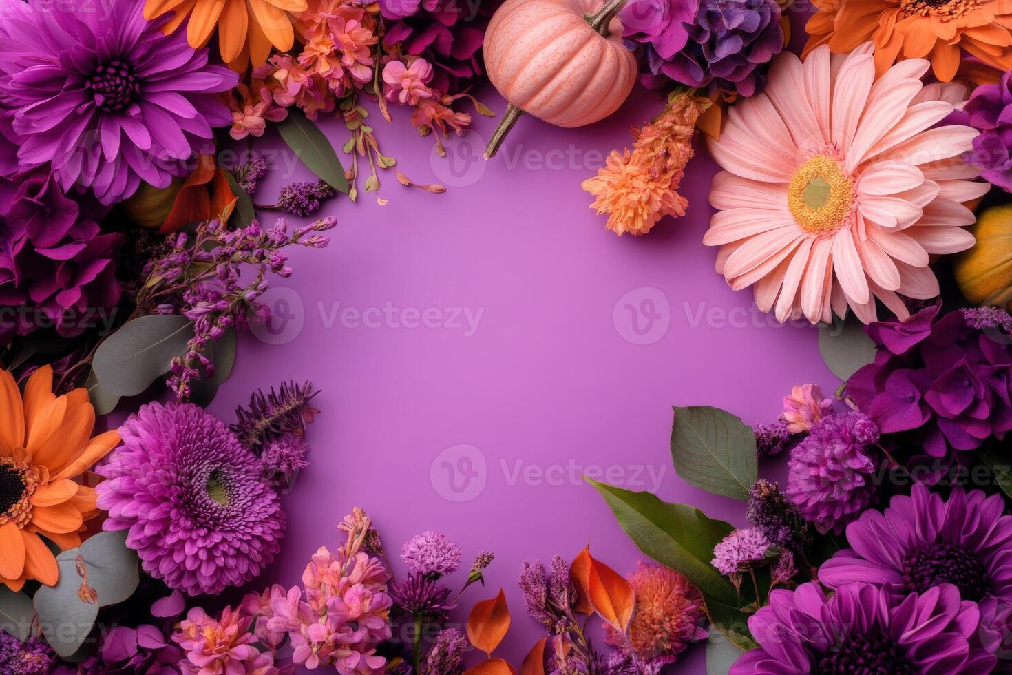 Autumn flowers and pumpkins in vibrant colors with blank space photo