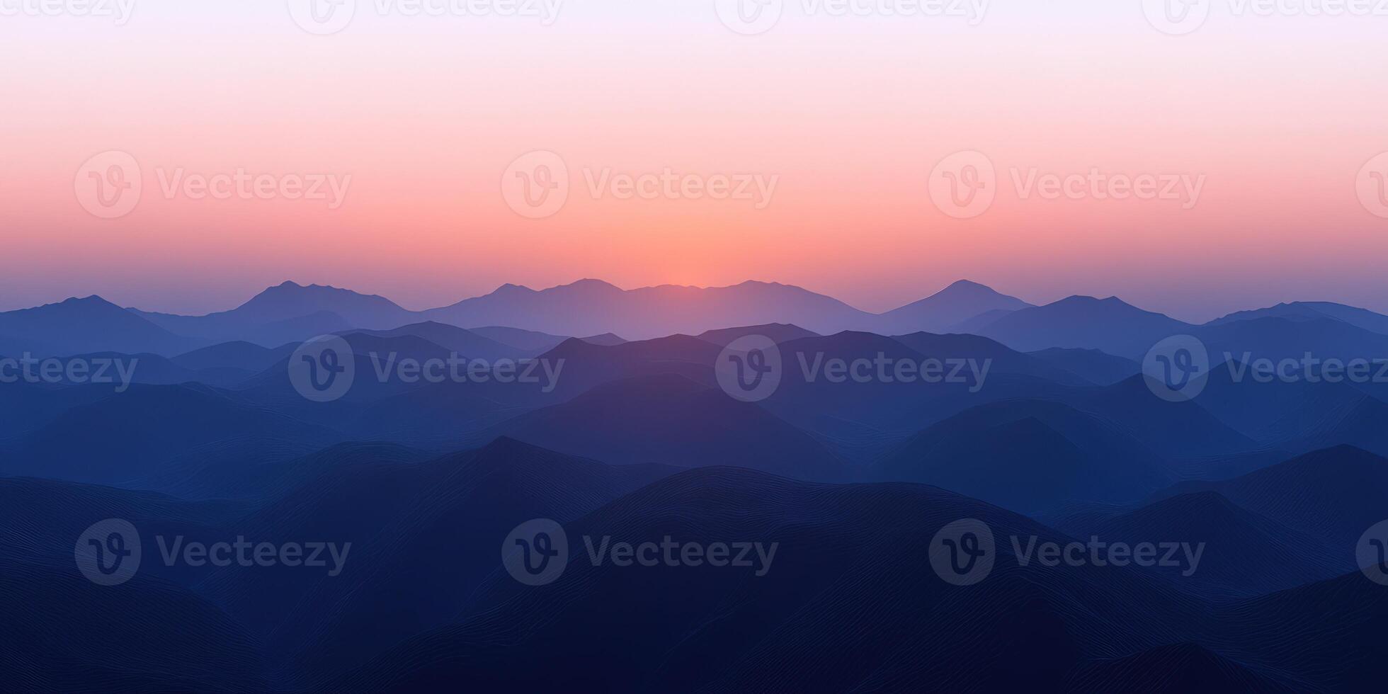 Fog-covered mountains at dusk creating a serene evening atmosphere photo