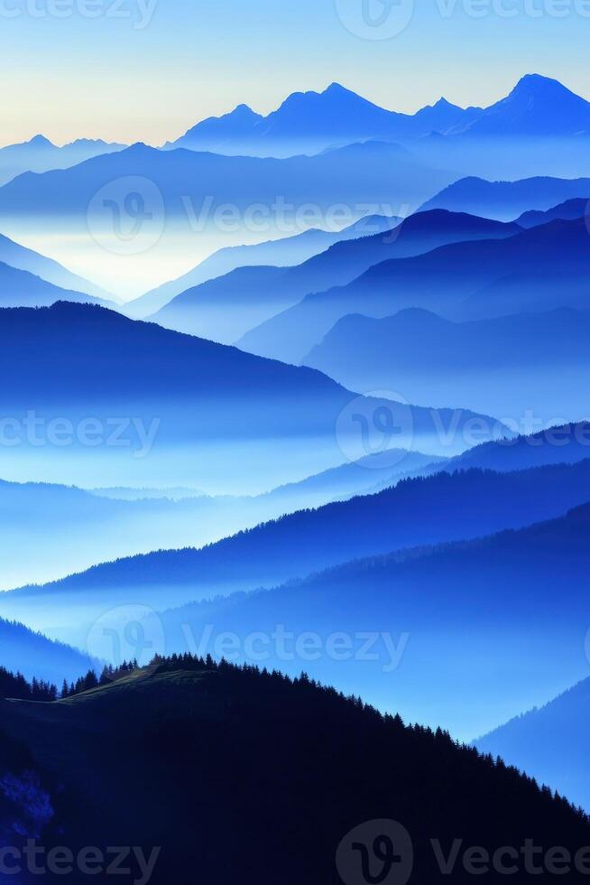 Fog-covered mountains in evening light creating a serene landscape photo