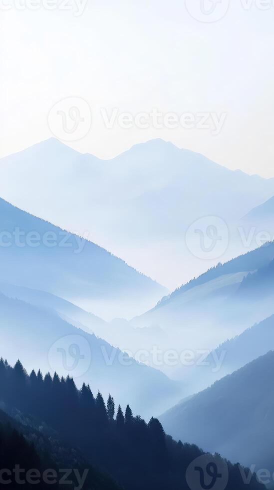 Evening fog envelops mountains creating a serene landscape photo