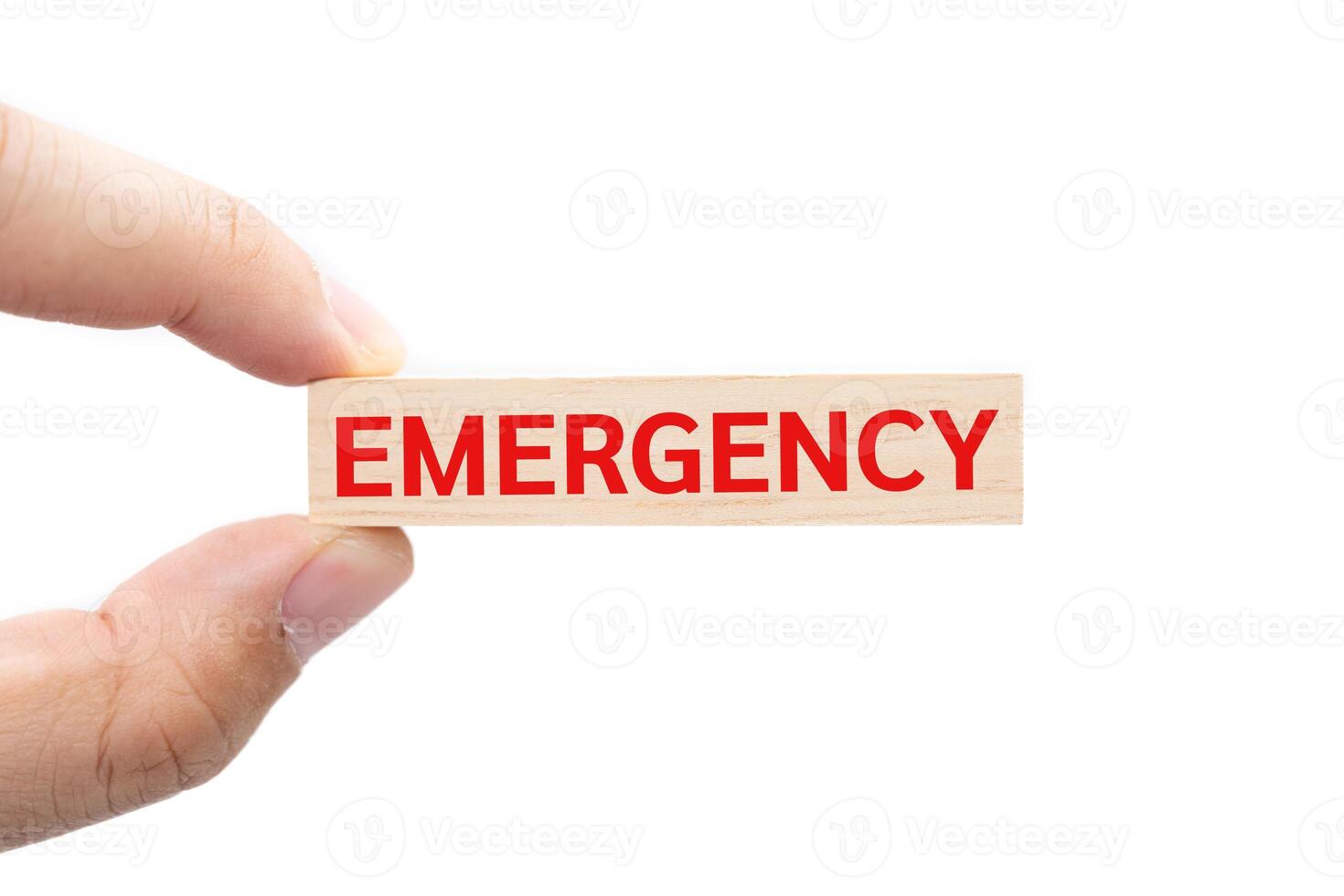 Text EMERGENCY on wooden block. Financial and business concept. retirement saving concept. money saving for rainy day. isolated on white background and clipping path. photo
