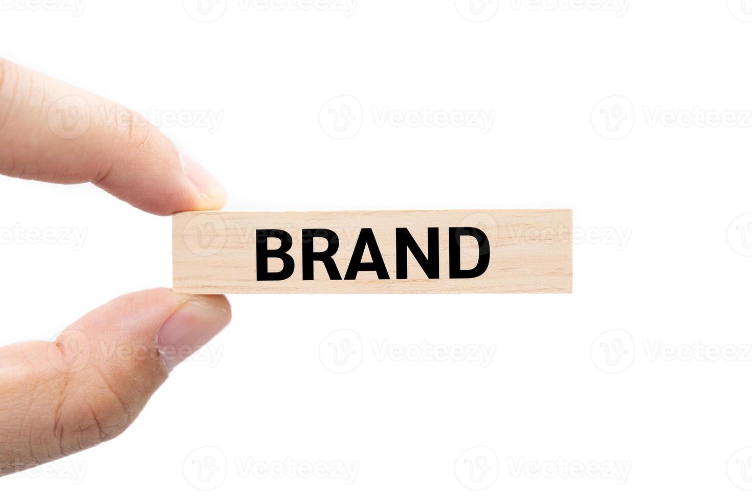 Text BRAND on wooden block with Clipping path isolate on white background. Build your Brand. Brand building, success, business. photo