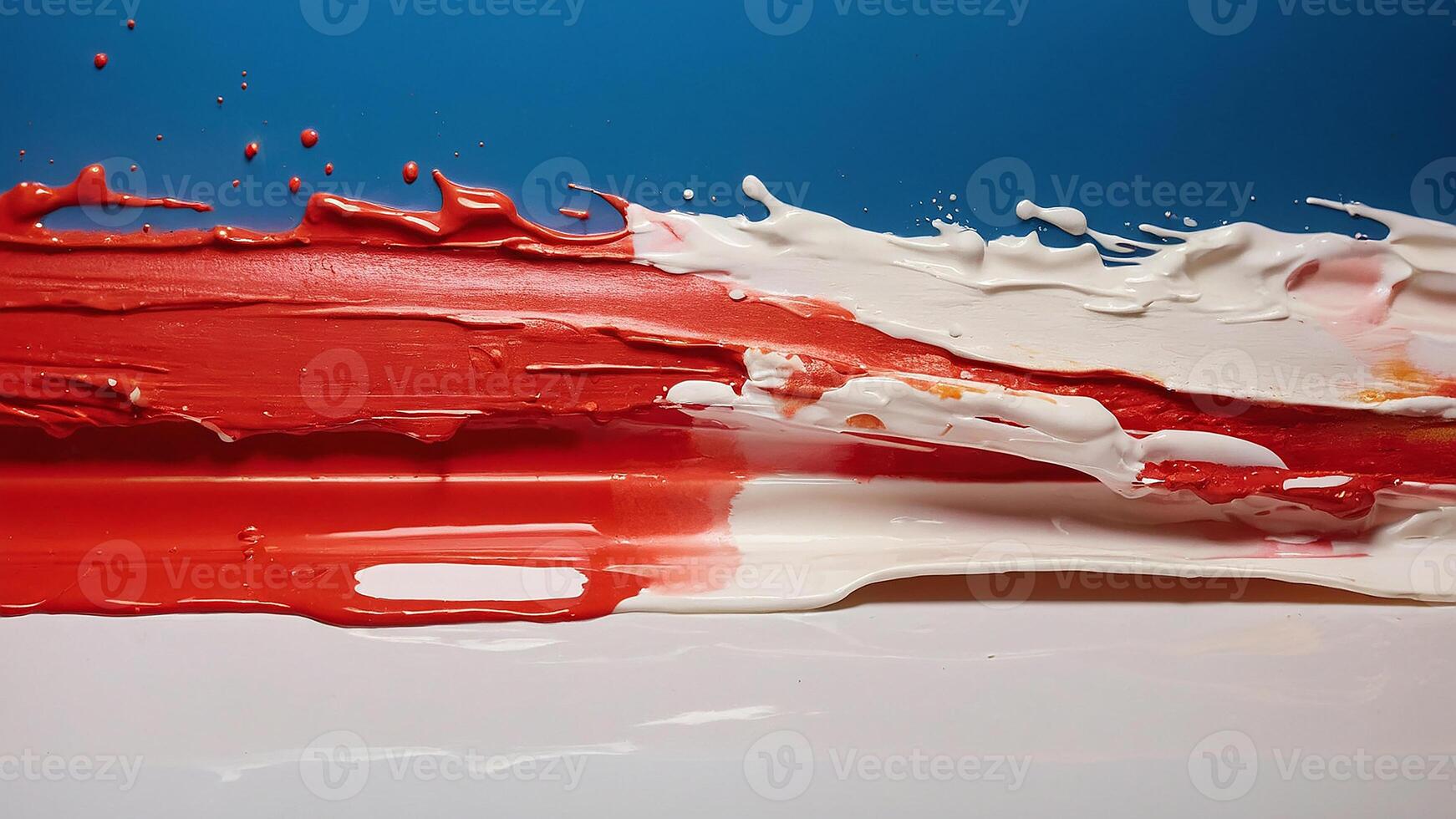 Abstract art with red, white, and blue paint. photo