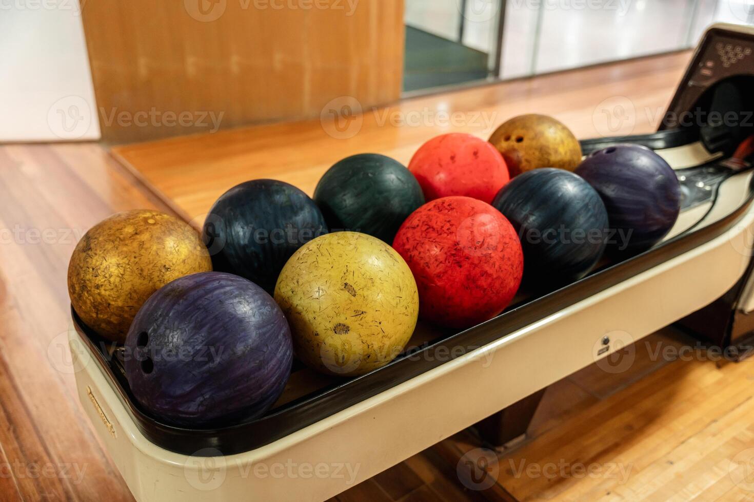 Bowling is a target sport and recreational activity in which a player rolls a ball toward pins photo