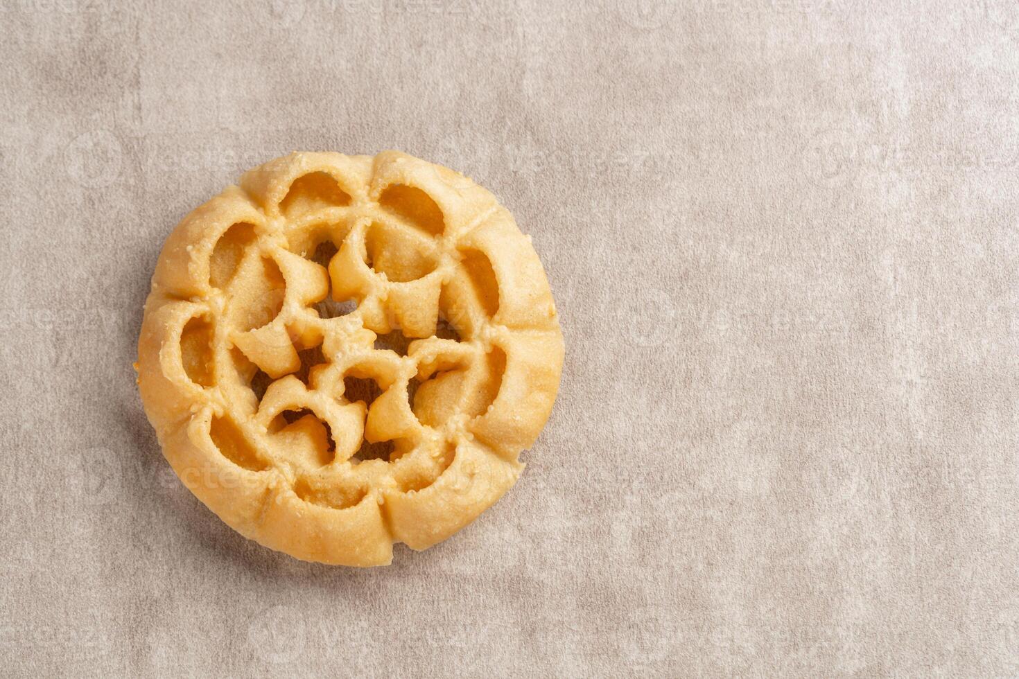 Kembang Goyang or shaking flower, Indonesian typical homemade crispy fried snack in flowers shape and typical of Betawi Snack. photo