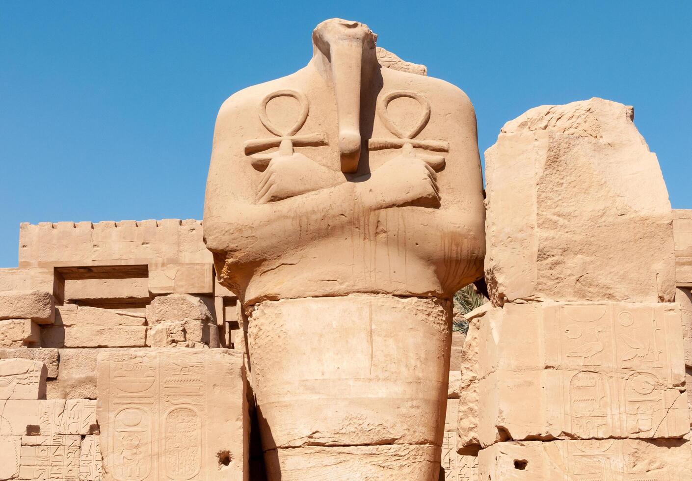 EGYPT, LUXOR - MARCH 01, 2019 ancient sandstone statues, Karnak Temple, Hall of caryatids. Luxor, Egypt photo