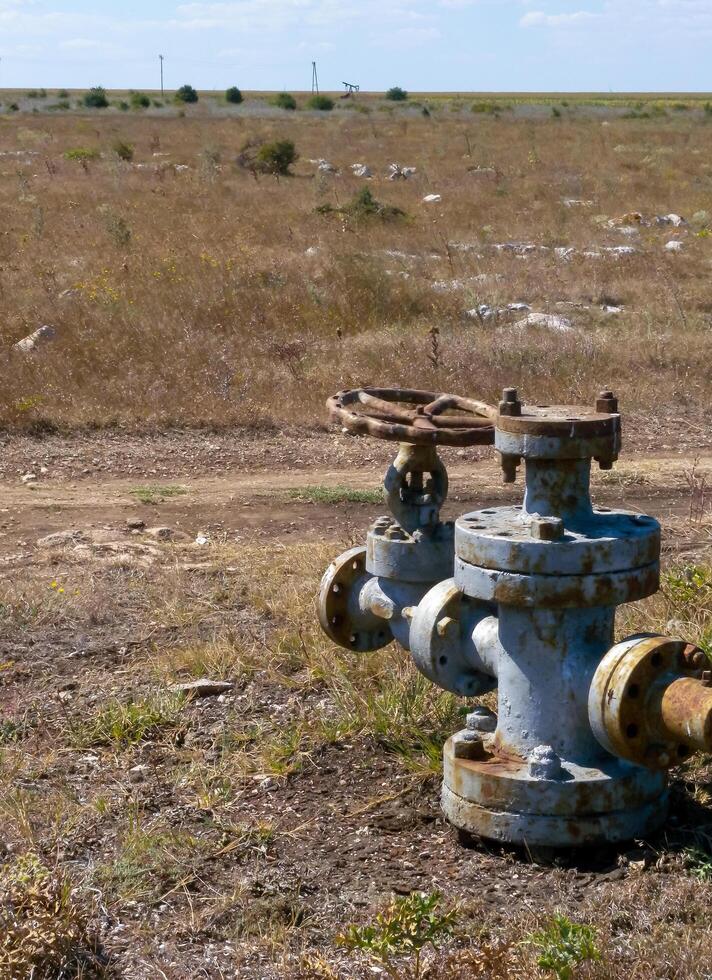 BULGARI, KALIAKRA - APRIL 02, 2013 - oil production from old wells on the seashore near the village of Tyulenovo, Black Sea photo