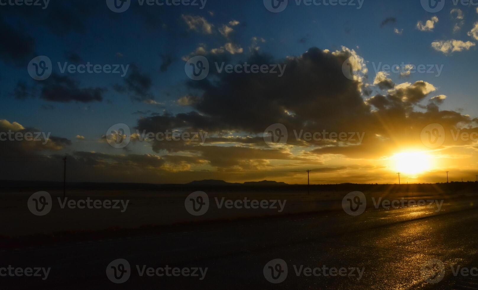 Big cumulus clouds in the evening during sunset in New Mexico photo