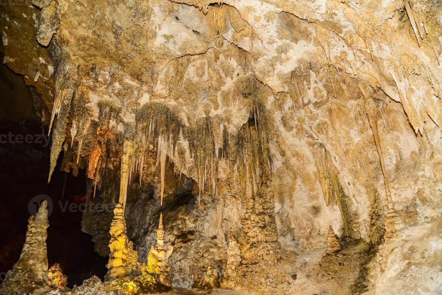 Calcite inlets, stalactites and stalagmites in large underground halls in Carlsbad Caverns National Park, New Mexico. USA photo