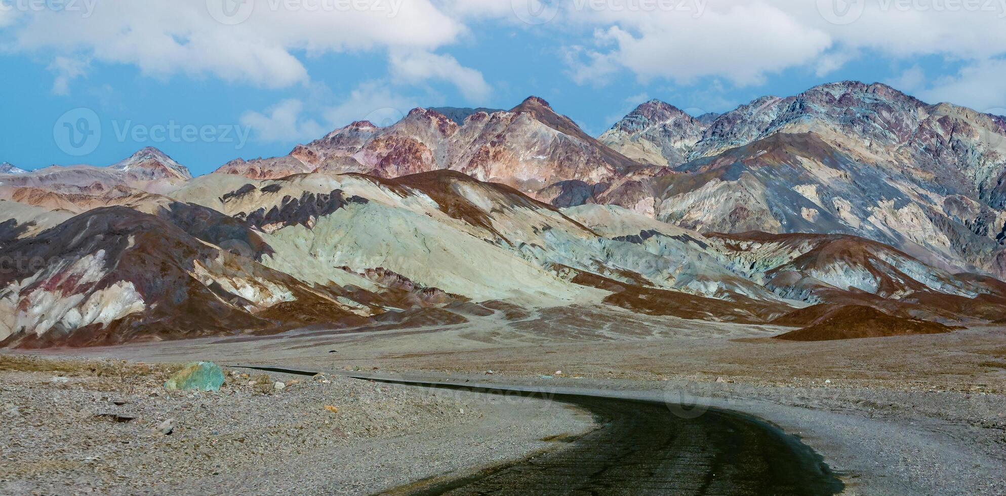 Colorful Hills in Death Valley National Park on a Sunny Day photo