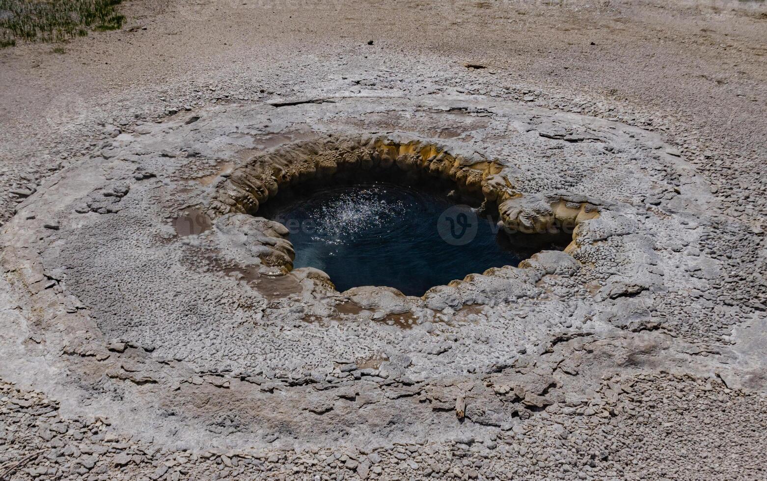 Boiling water bubbler Geyser. Active geyser with major eruptions. Yellowstone NP, Wyoming, US photo