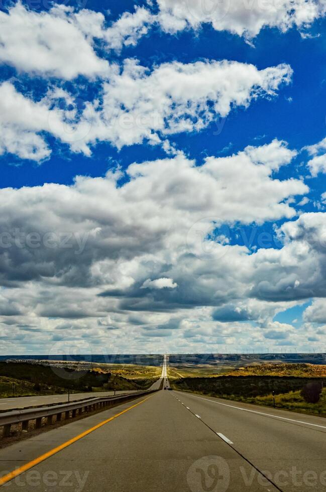 Rain clouds during the day over the plains in Utah, US photo