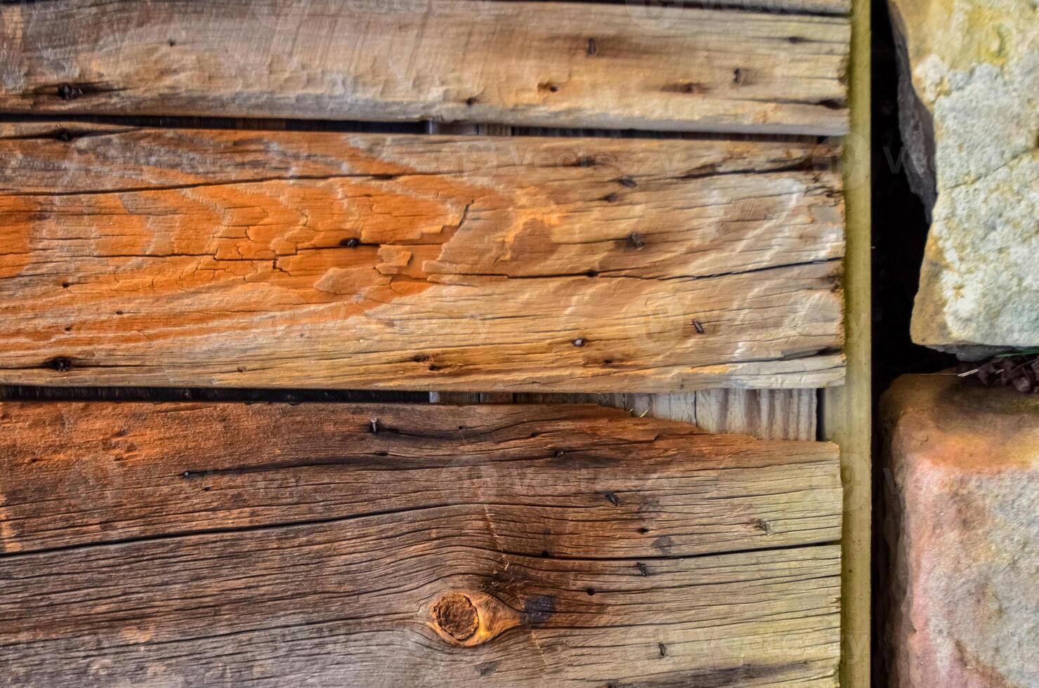 Wooden background, vintage rotten planks that survived on an old 18th century barn, Ohio USA photo