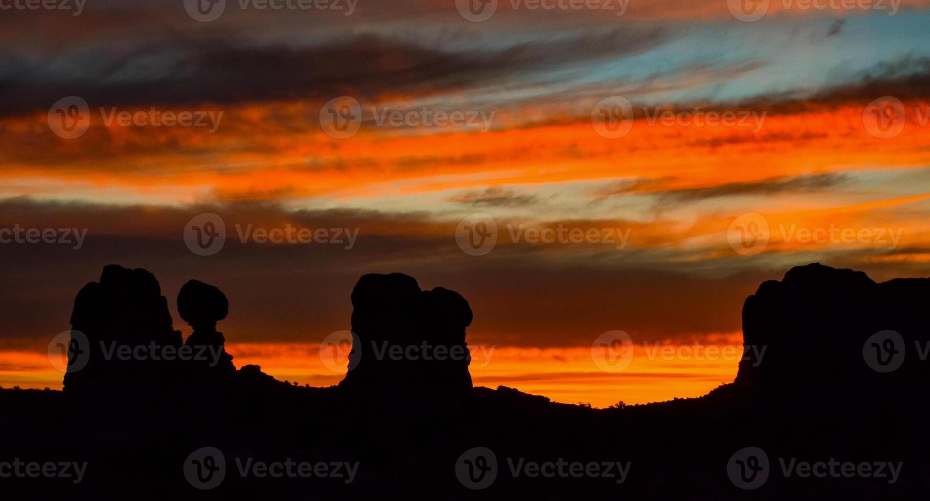 Evening sunset against the backdrop of the mountain landscape, and the red mountains. Canyonlands, Moab, Utah photo