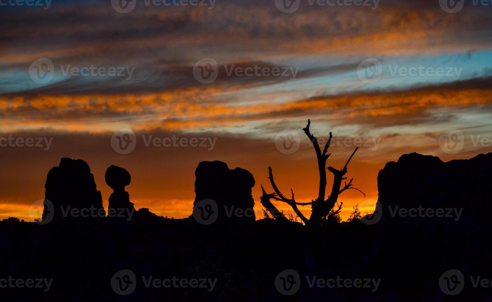 Evening sunset against the backdrop of the mountain landscape, and the red mountains. Canyonlands, Moab, Utah photo