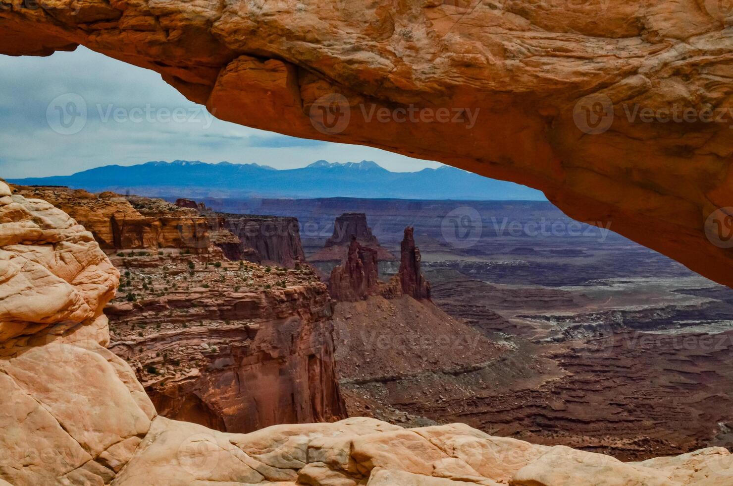 View from Mesa Arch in Canyonlands National Park near Moab, Utah, US photo
