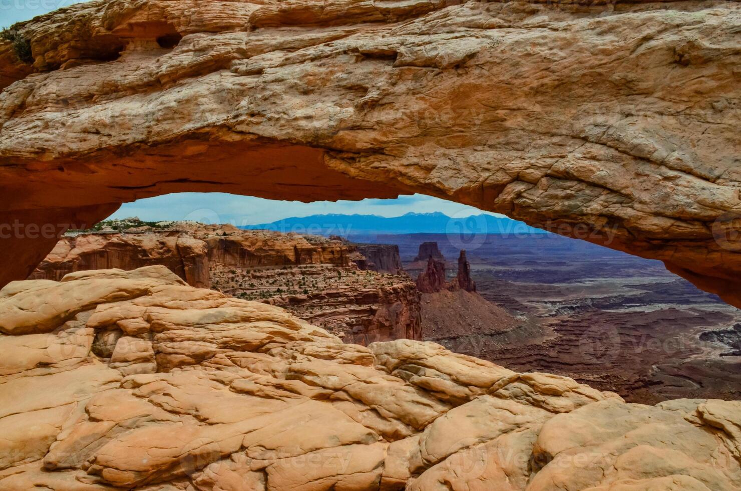 View from Mesa Arch in Canyonlands National Park near Moab, Utah, US photo