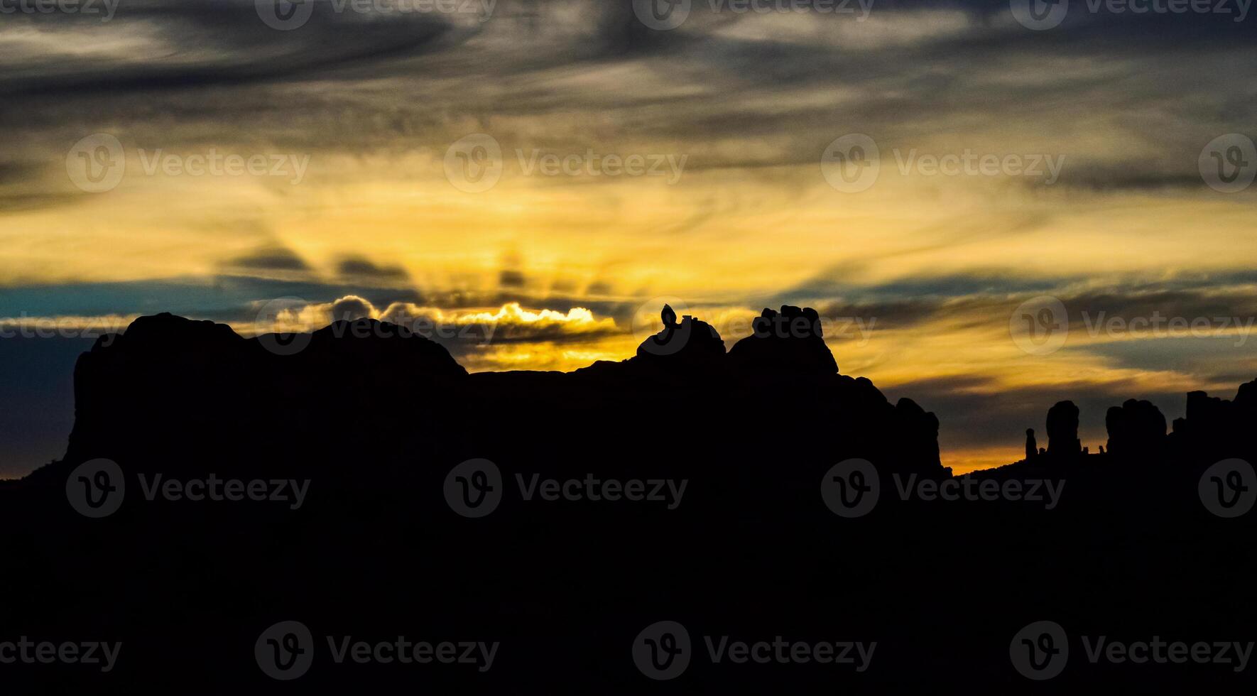 Evening sunset against the backdrop of the mountain landscape, and the red mountains. Canyonlands, Moab, Utah photo
