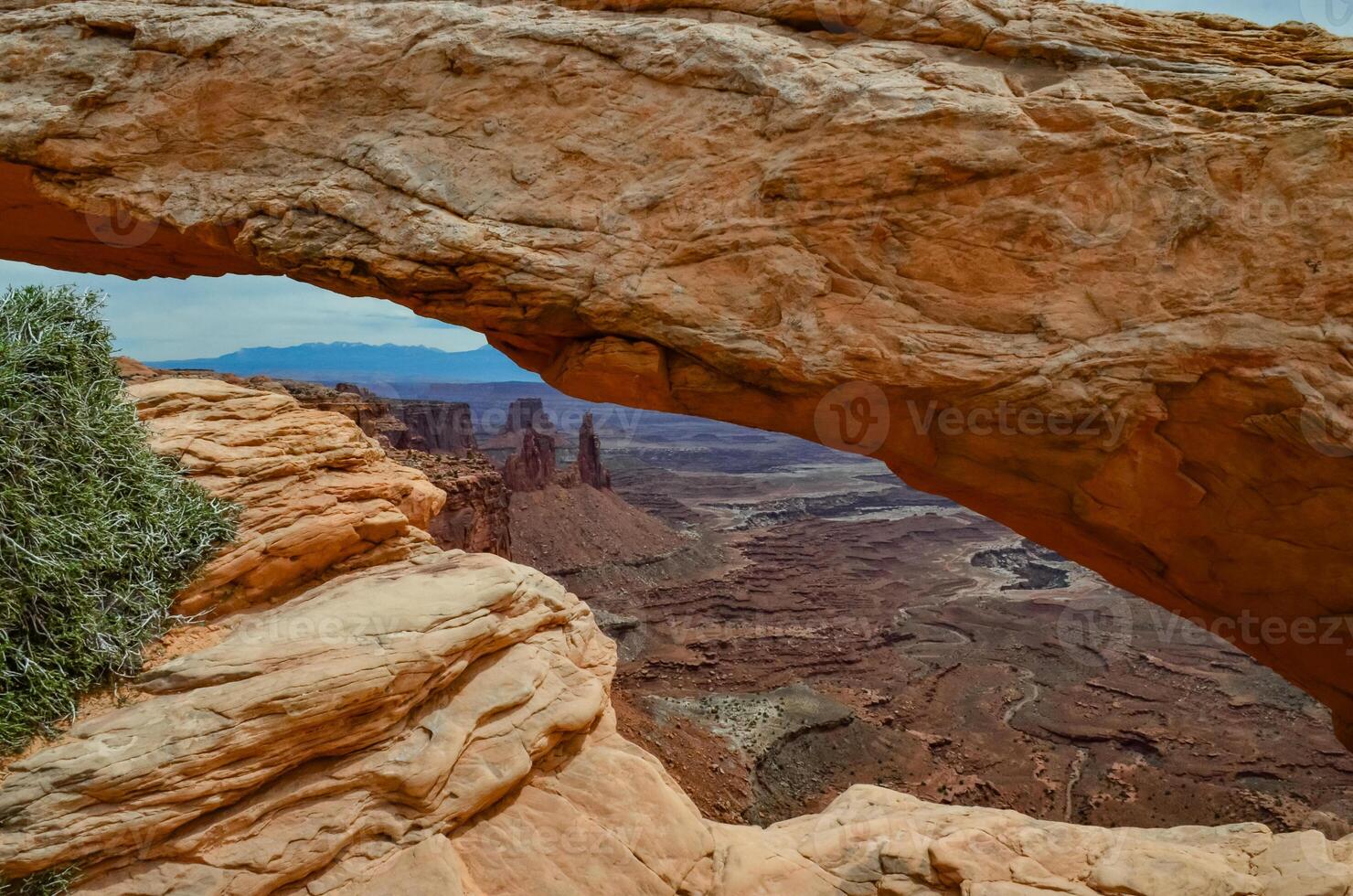 View from Mesa Arch in Canyonlands National Park near Moab, Utah, US photo