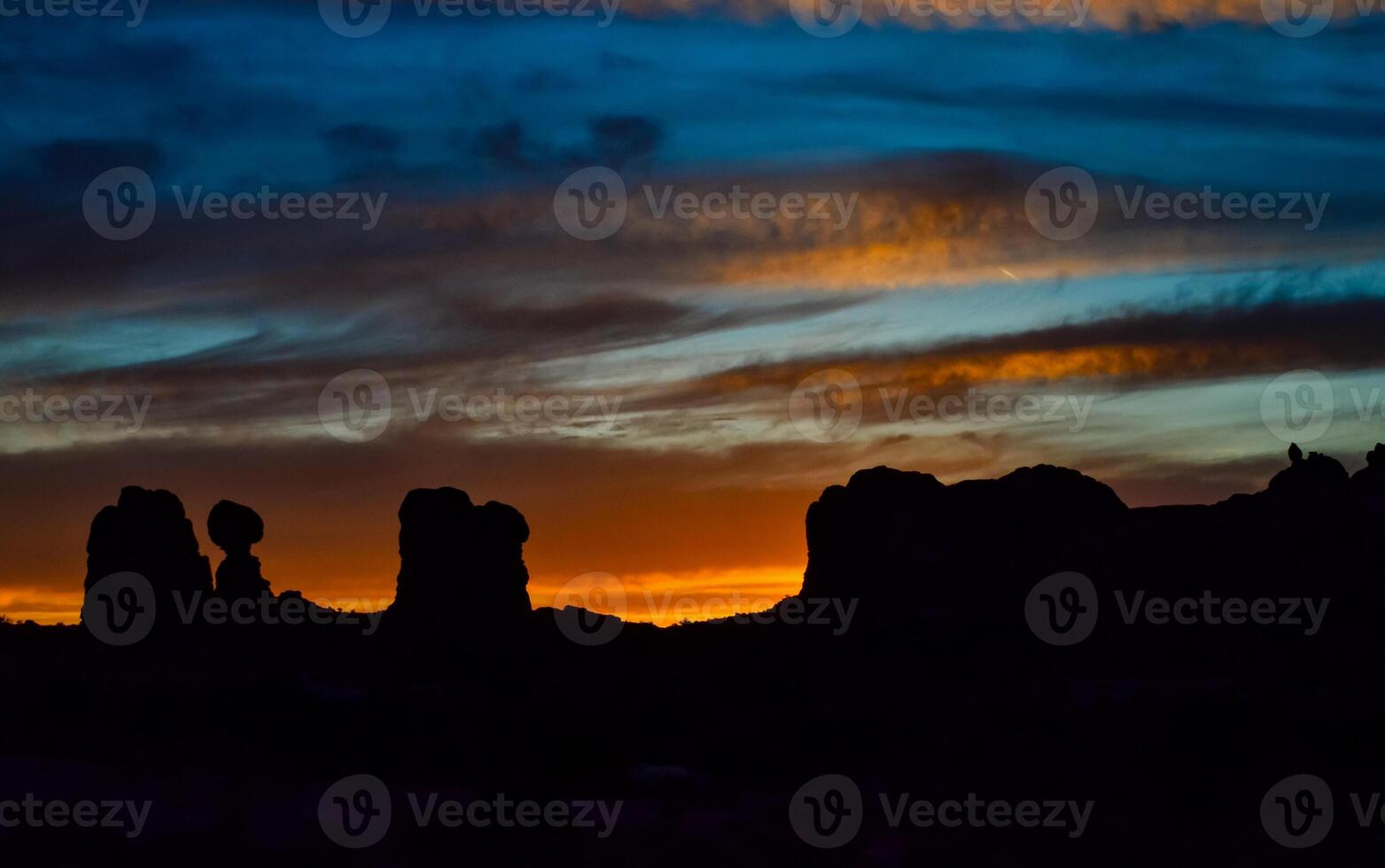 Evening sunset against the backdrop of the mountain landscape, and the red mountains. Canyonlands, Moab, Utah photo