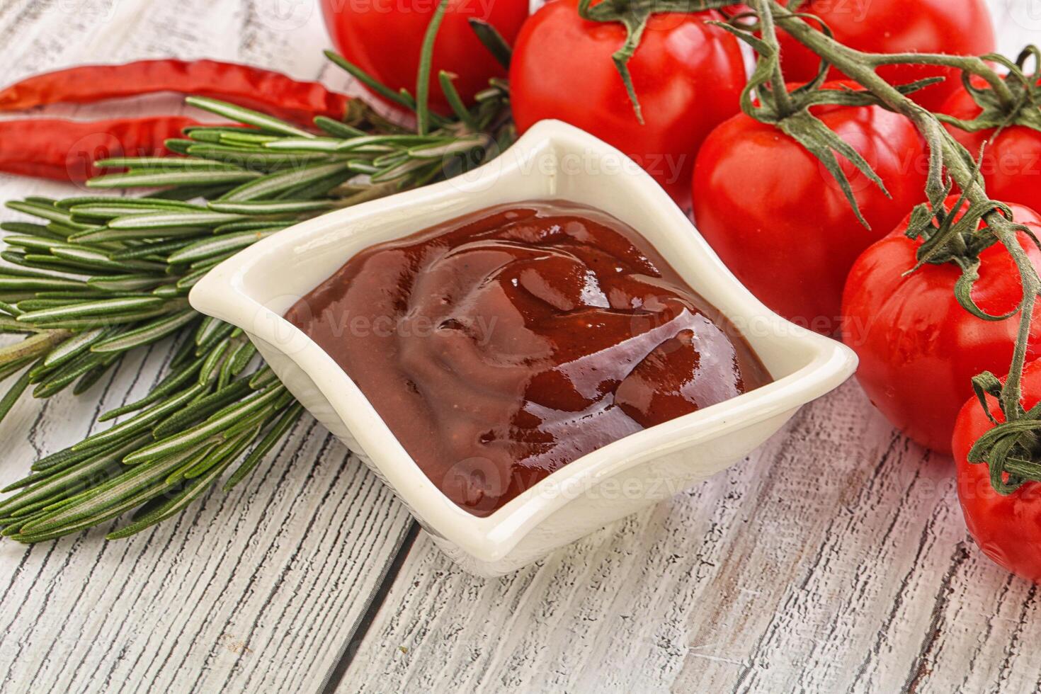 Tomato barbecue sauce on the bowl photo