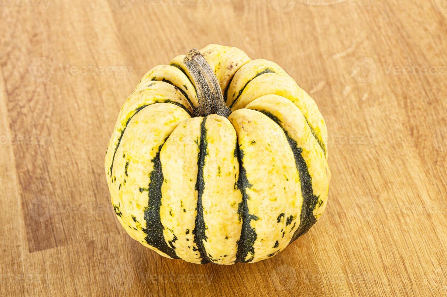 Ripe raw fresh decorative pumpkin photo