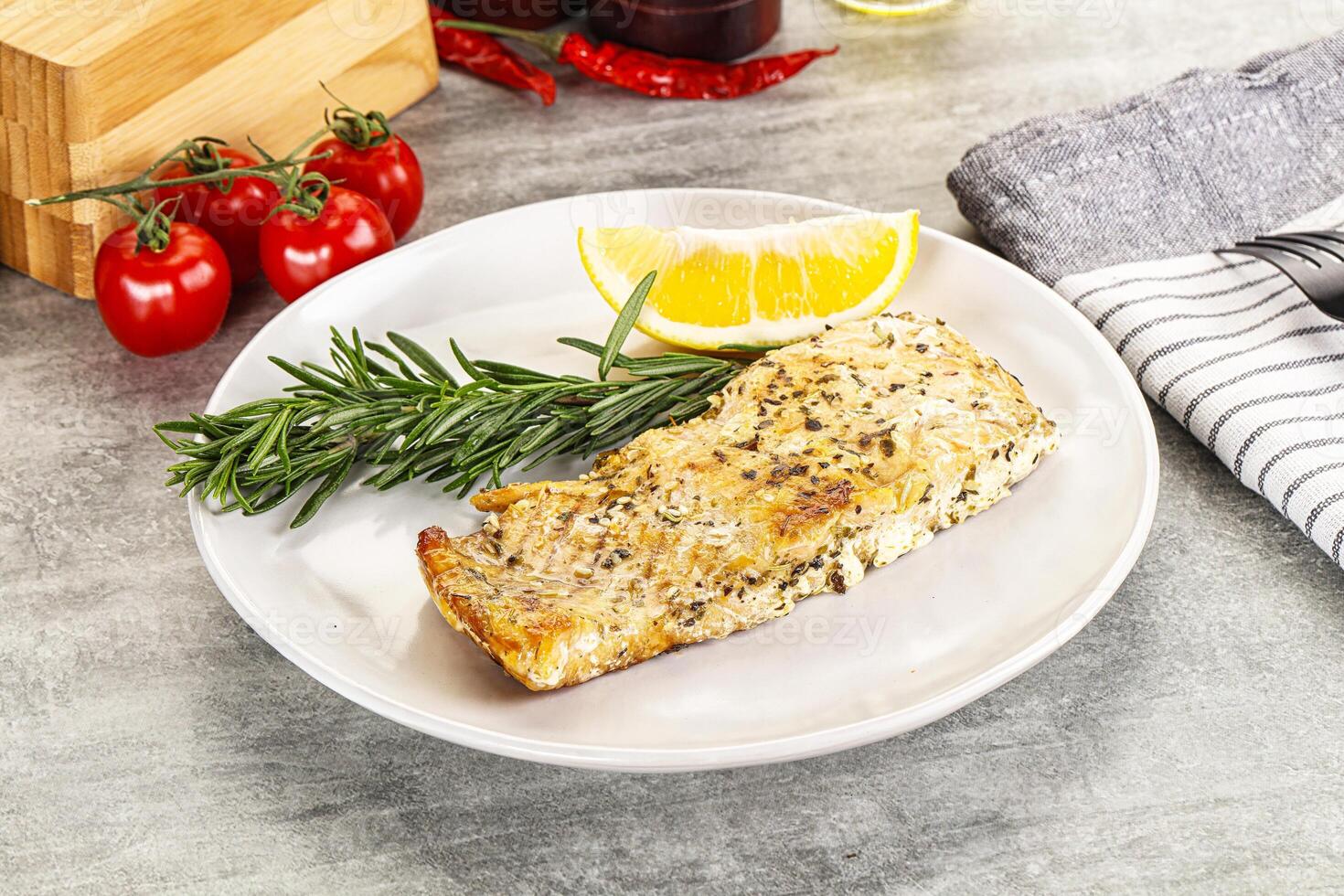Baked salmon fish served rosemary photo