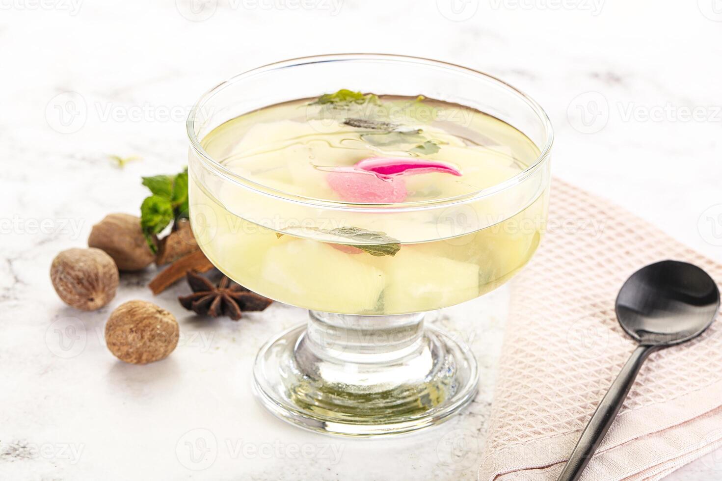 Sweet pineapple jelly with mint photo