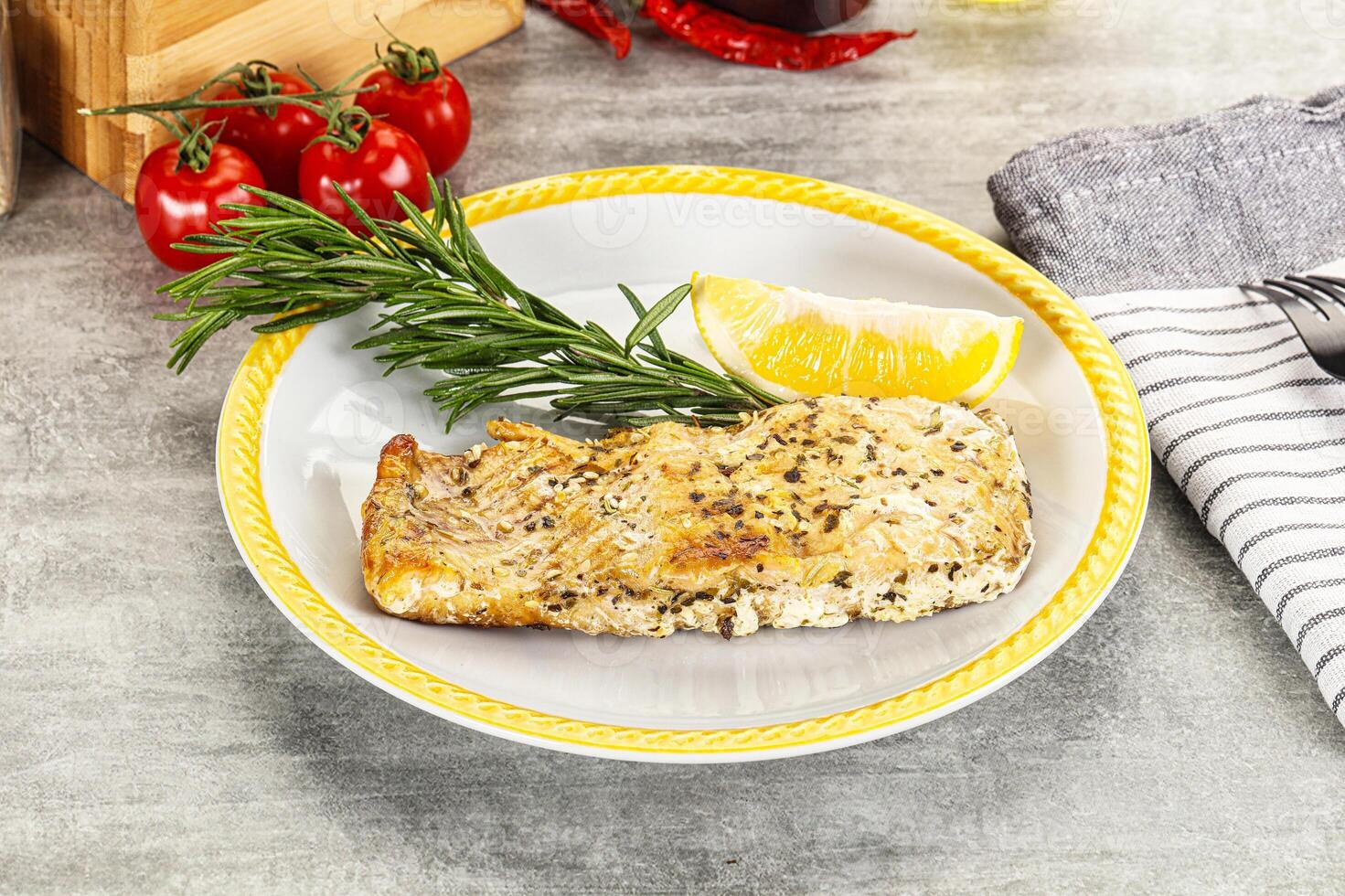 Baked salmon fish served rosemary photo