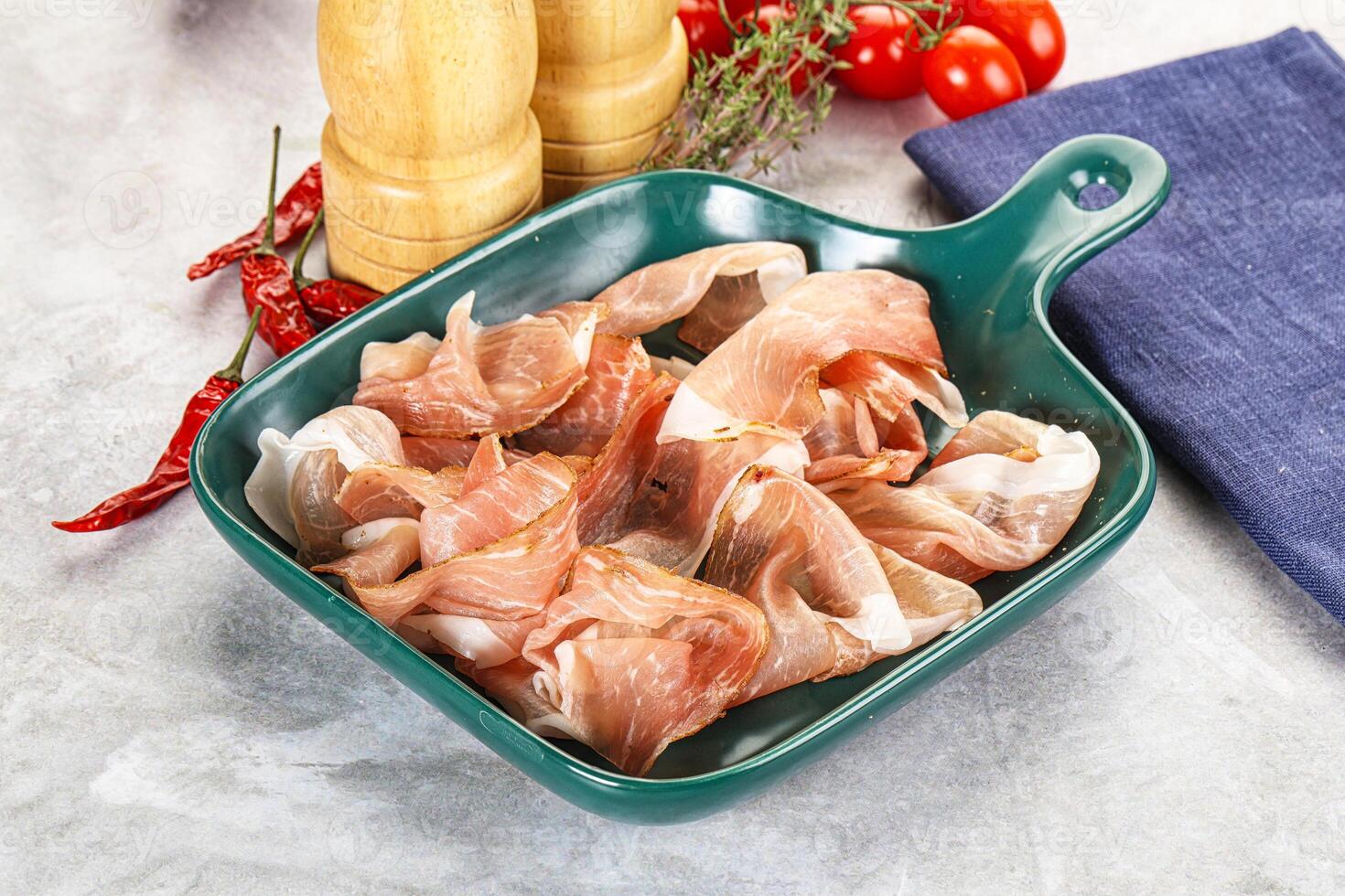 Spanish cured pork meat - Jamon photo