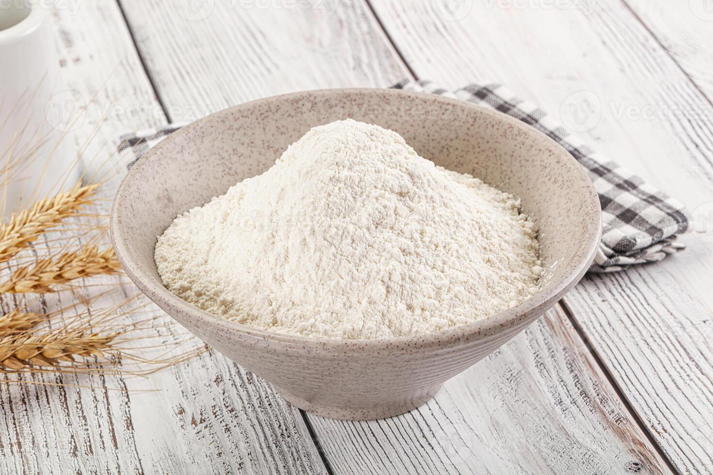 Wheat flour heap for bake photo