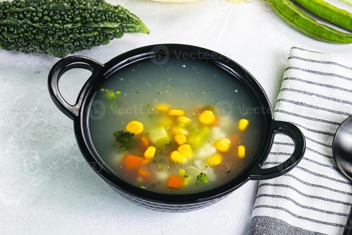 Soup with corn and broccoli photo