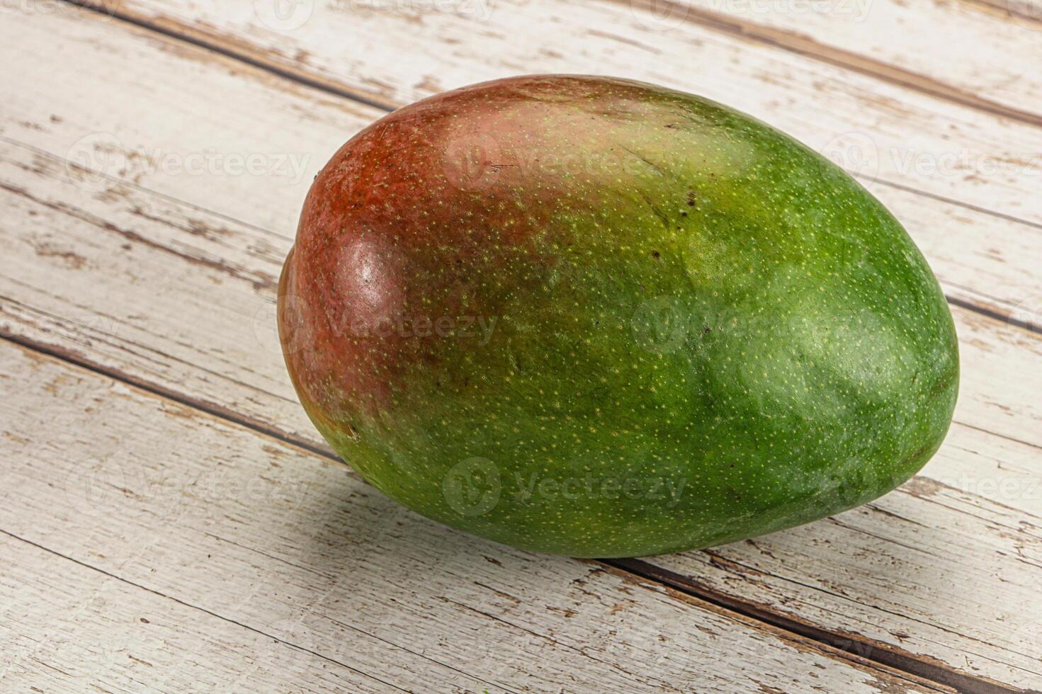Sweet juicy green and red mango photo