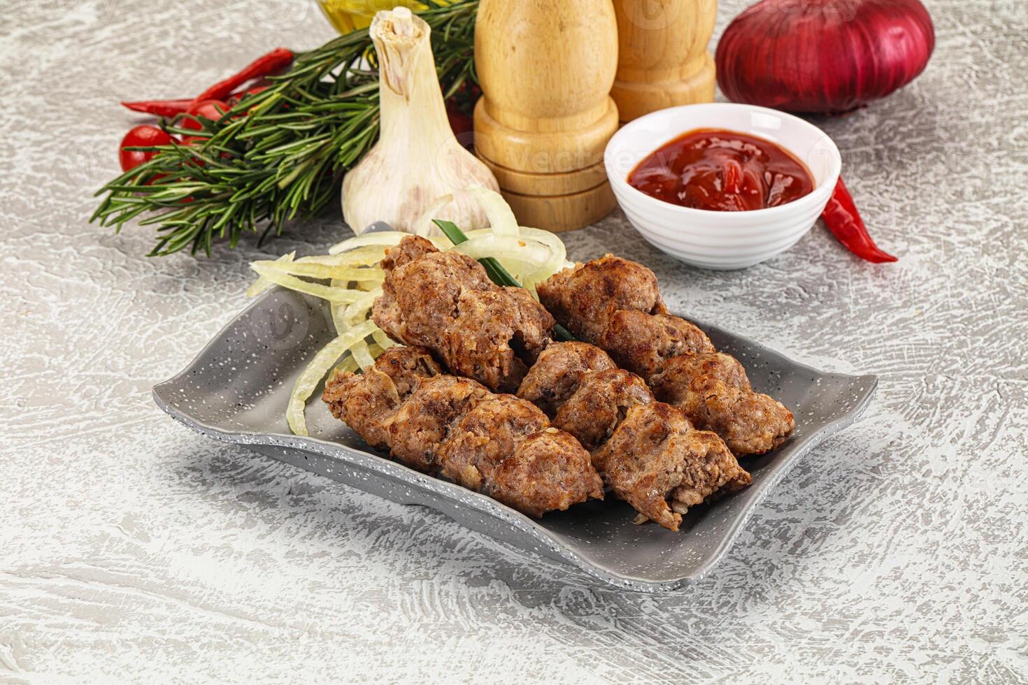 Beef kebab minced meat with onion photo