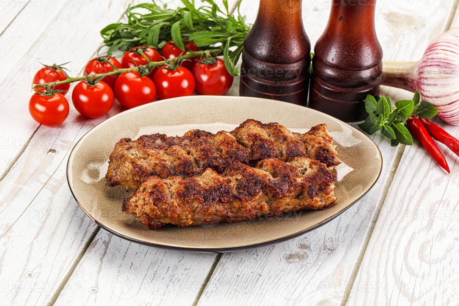 Chicken kebab minced meat and spices photo