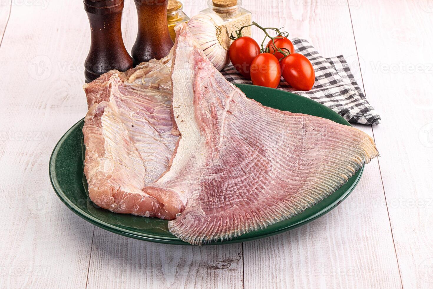 Raw uncooked stingray fish wing photo