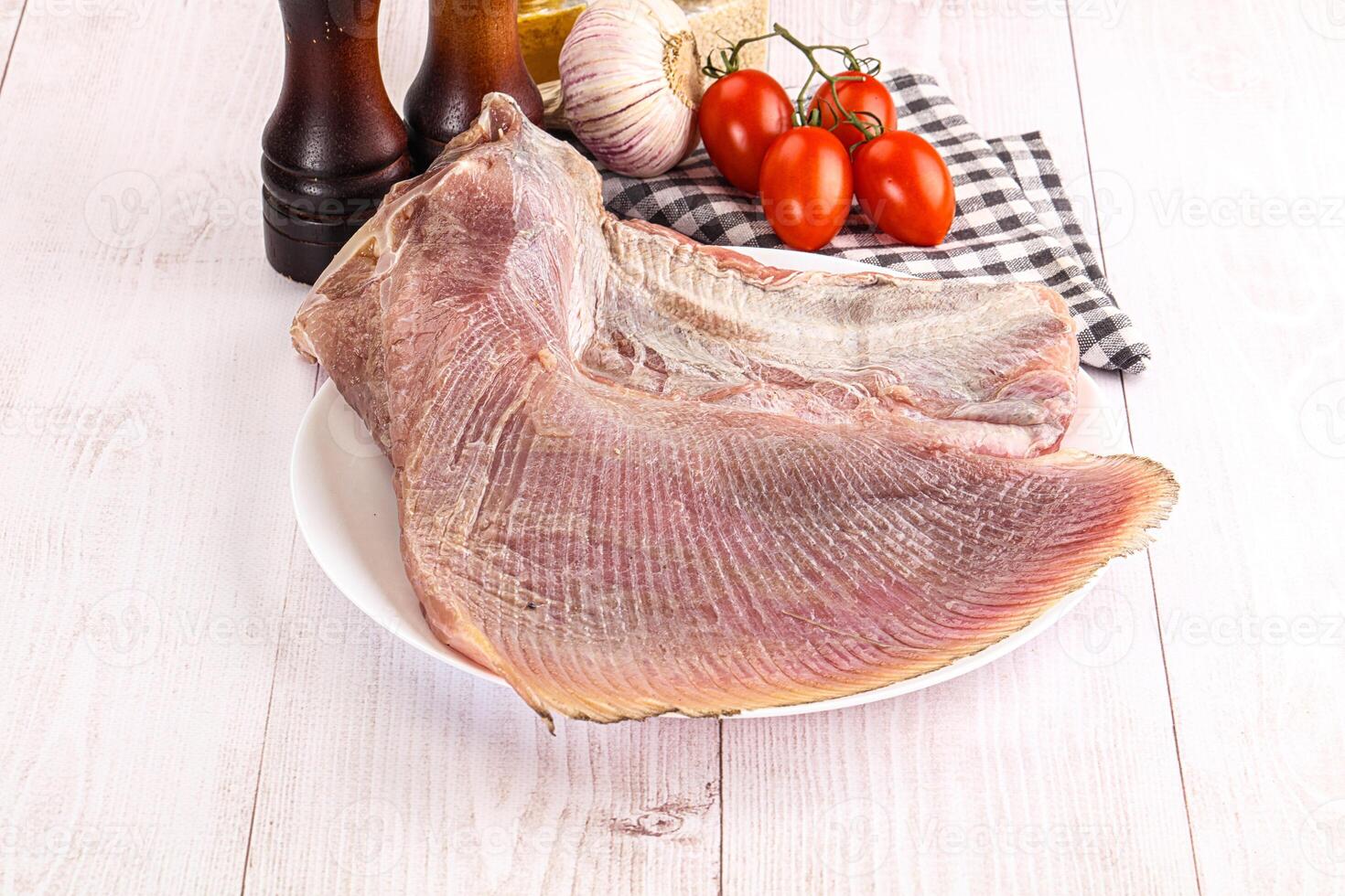 Raw uncooked stingray fish wing photo