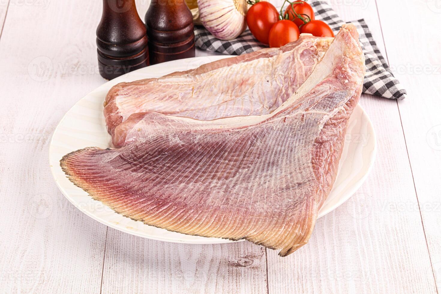 Raw uncooked stingray fish wing photo