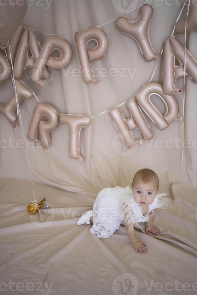 photo session on the first birthday of a baby girl, in pastel colors, minimalism