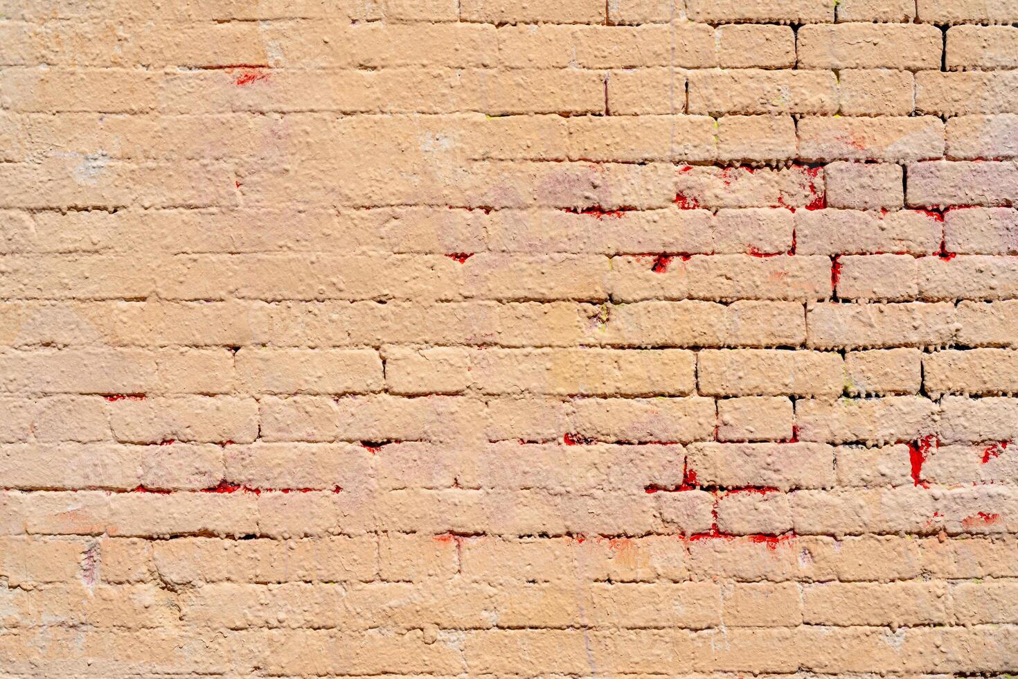 The background of the old beige brick wall for design interior and various scenes or as a background for interviews. photo
