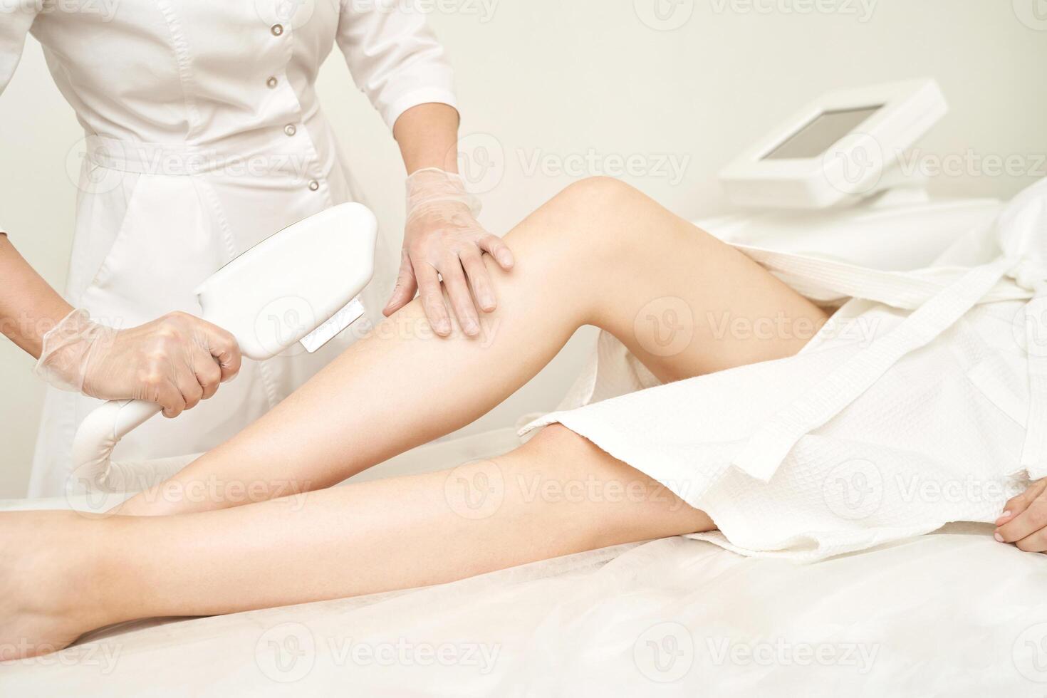 Laser hair removal treatment. Leg. Clinic skin care procedure. Medical dermatology photo equipment. People epilation device. Cosmetology technology salon epilation. Body aesthetic concept