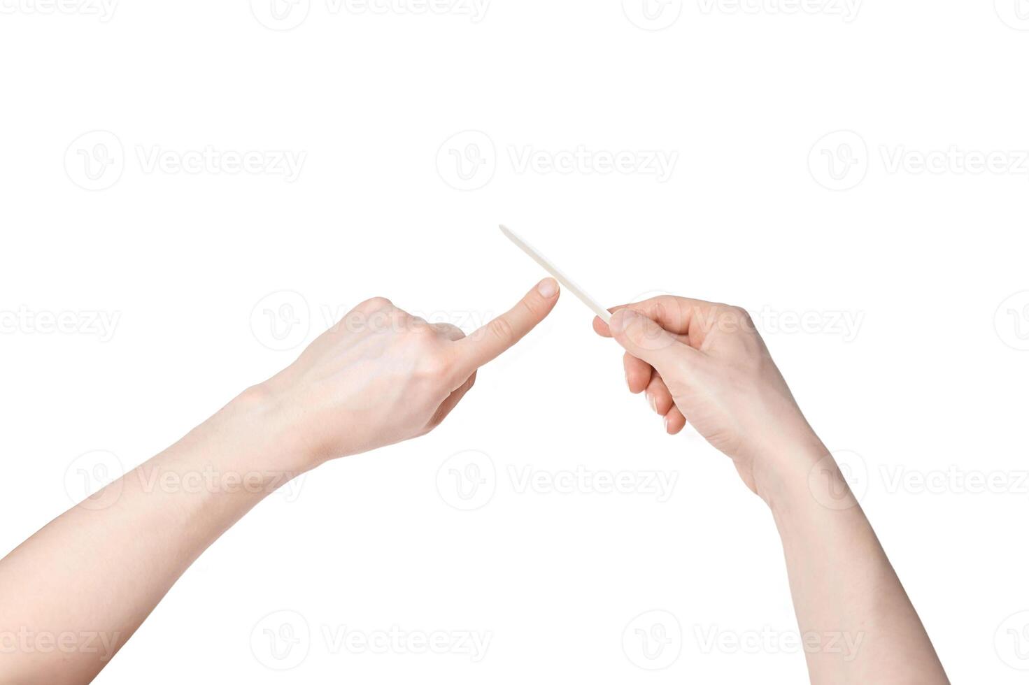 Man do manicure at home. Nail file. Self hand routine. Place for text. Male finger procedure. White background isolated. Copyspace. Forefinger fingernail clean. Man manicurist service. photo