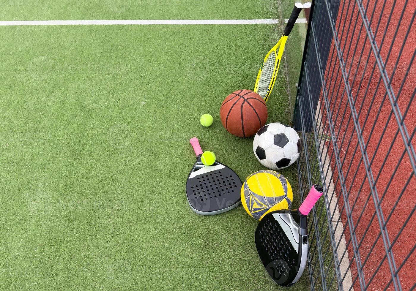 various balls on the court photo