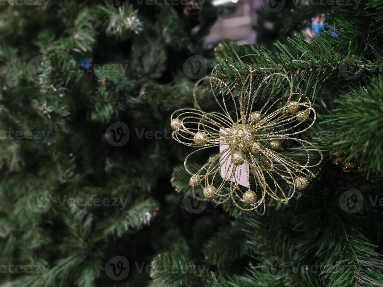 Christmas toys and decorations. Christmas and New Year background. Lanterns and balls, beads on the branches of a Christmas tree. Banner for the Christmas holidays. photo