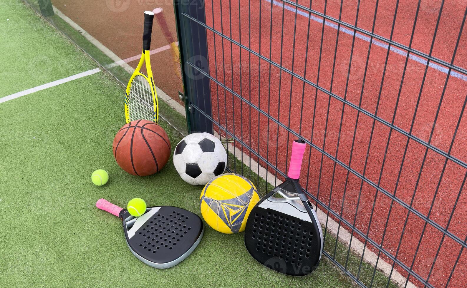 various balls on the court photo